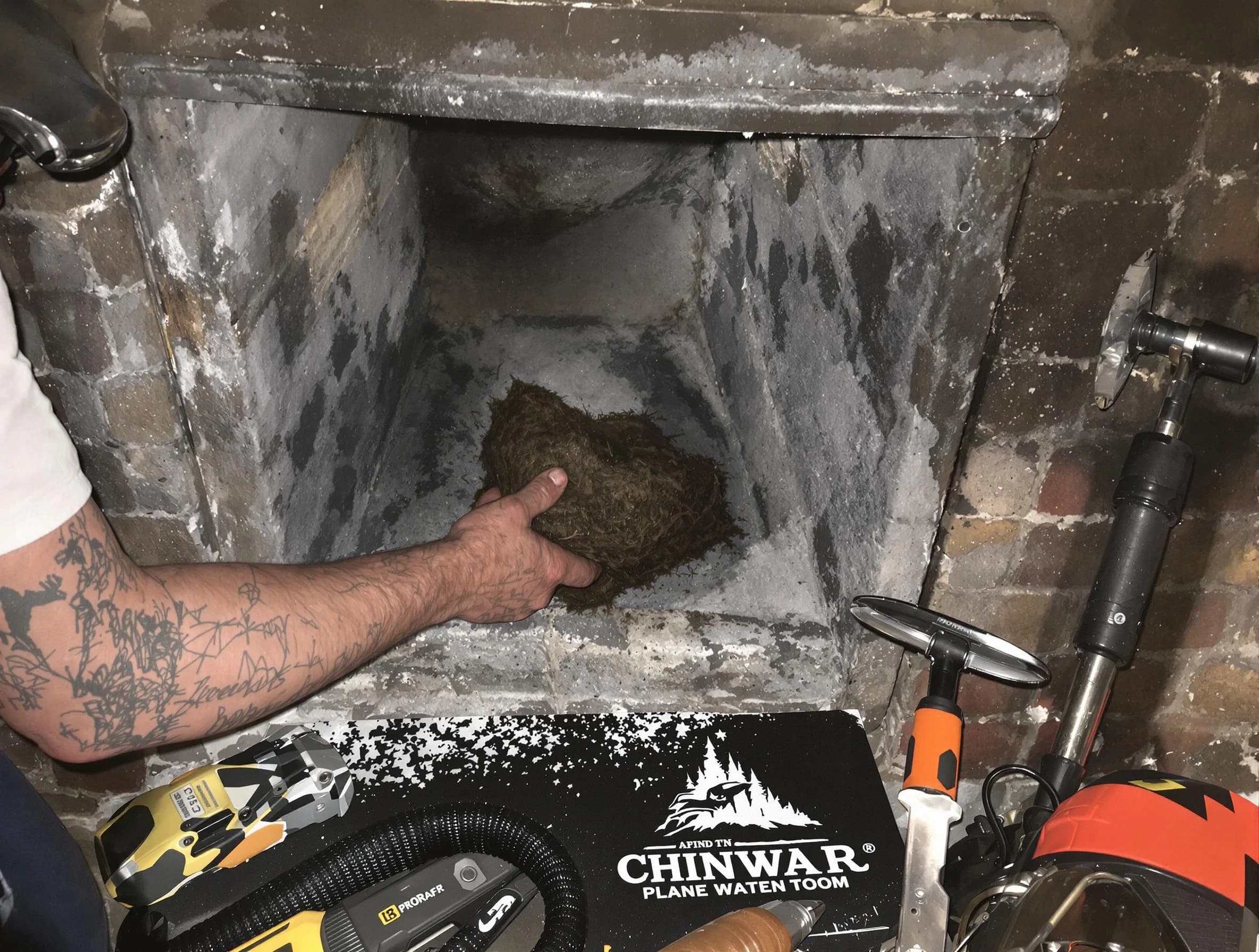 Acton Chimney Sweep safely removing debris and screening chimney in Acton, MA