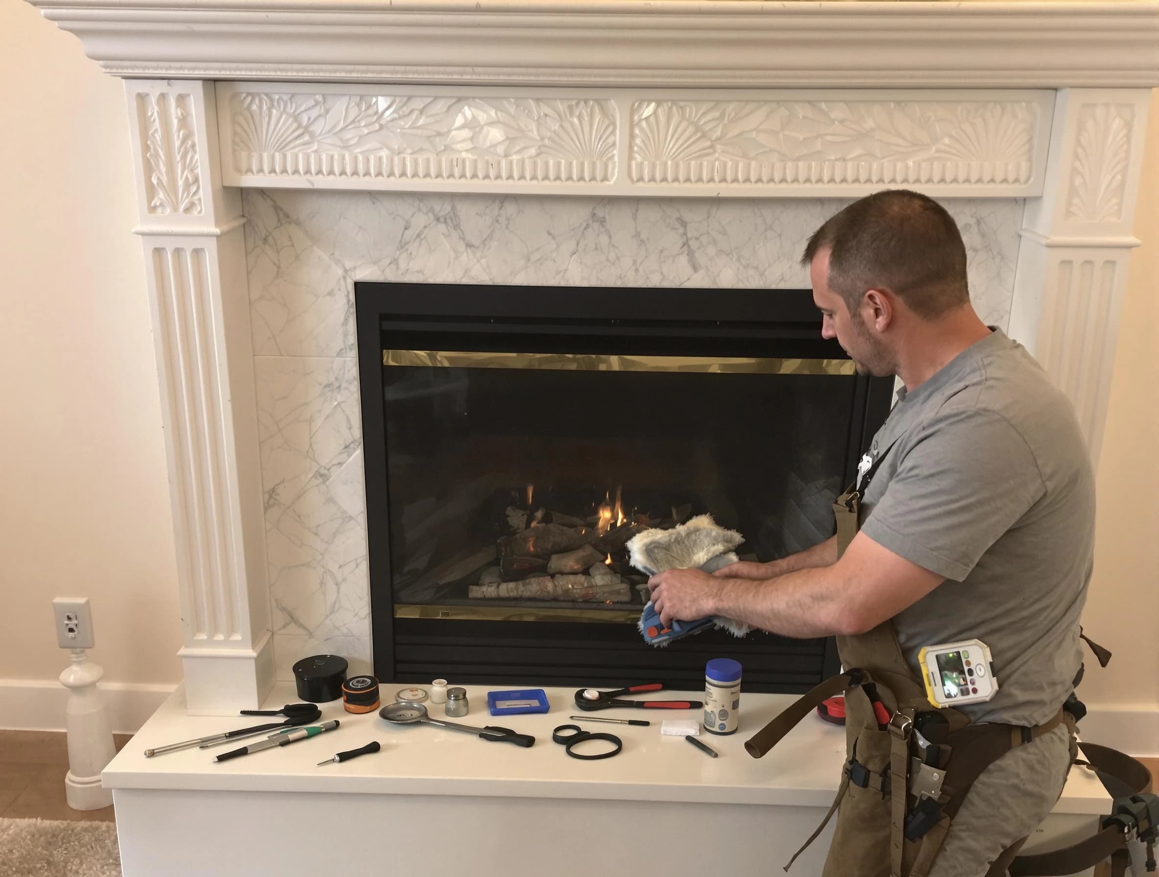 Acton Chimney Sweep performing fireplace maintenance in Acton, MA